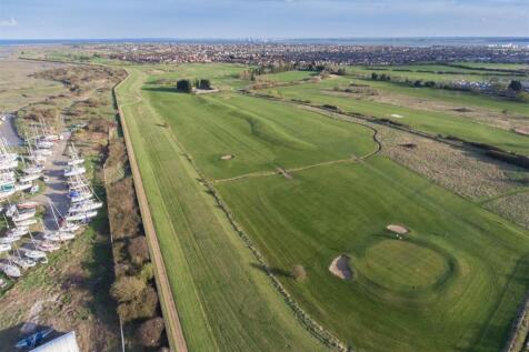 Drone shot Of Golf Course and Surrounding Area Clo