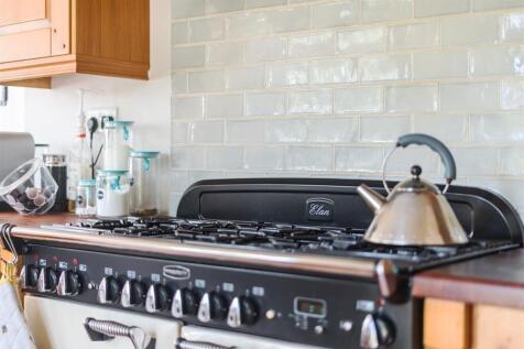 Rangemaster with 6 Gas Burners and Twin Electric O