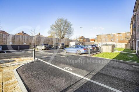 PARKING TO REAR OF BLOCK