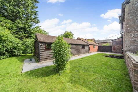 Outbuilding containing laundry, library, study