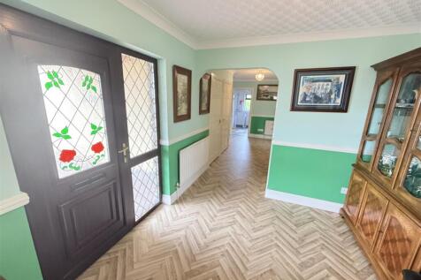 Recessed front entrance door to: