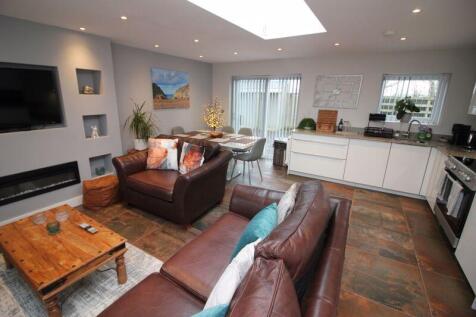 open plan lounge dining room and kitchen