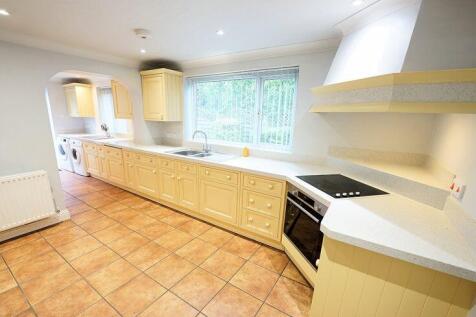 Kitchen leading to the utility room