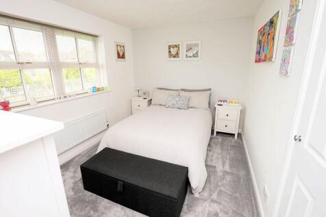 Bedroom 2 with wardrobes