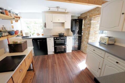 Kitchen leading to a conservatory