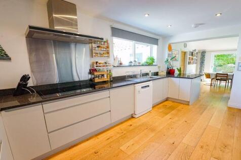 Kitchen leading to the open plan fami...