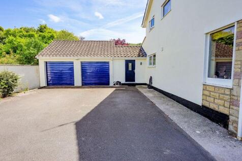 Plenty of parking and double garage, ...