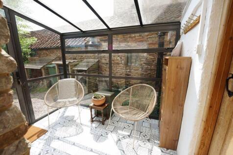 To the utility area and to the garden