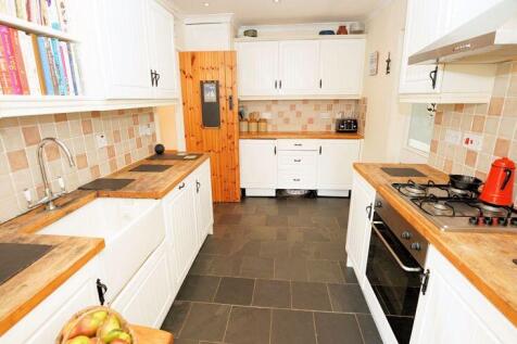 Kitchen with built in oven and hob