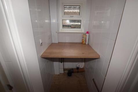 INNER LOBBY CUM LAUNDRY AREA