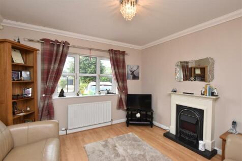 SITTING ROOM (FRONT)