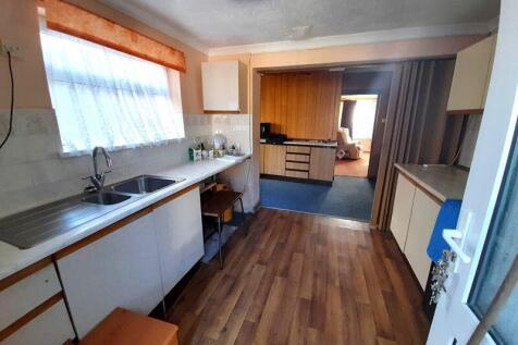 Kitchen into Front Room