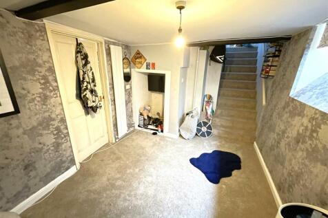 Stairs down from the living/dining room