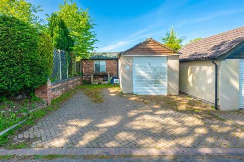 Detached Garage and Parking Area