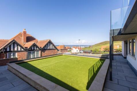 Garage laid with artificial grass
