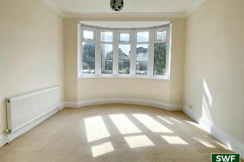 THROUGH LOUNGE/DINING ROOM