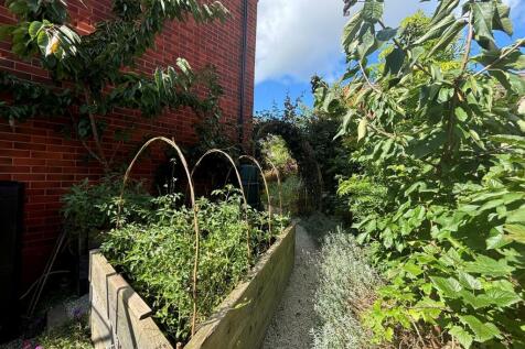 To The Side of the Property