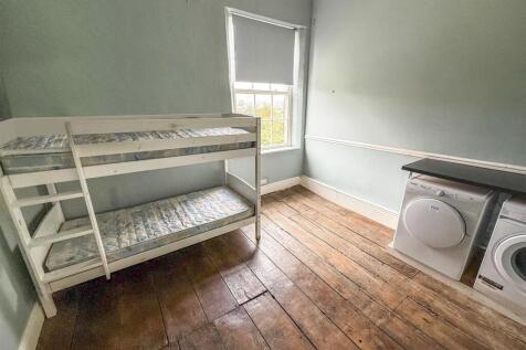 Bedroom Five/Laundry