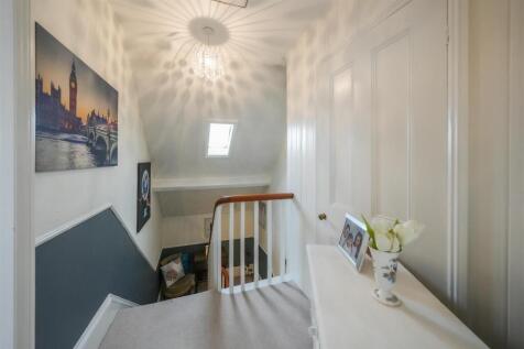 SECOND FLOOR LANDING WITH LOFT FOR STORAGE