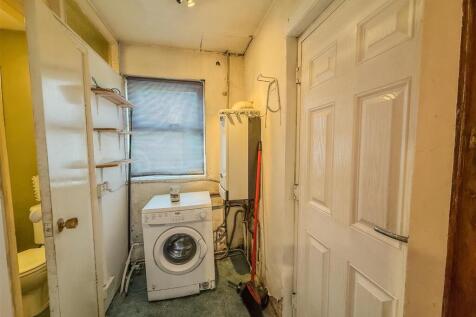 REAR HALLWAY/UTILITY AREA