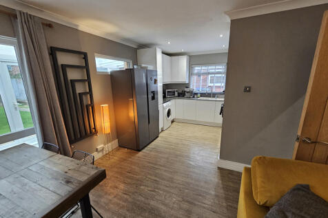 Living dining room looking into kitchen 