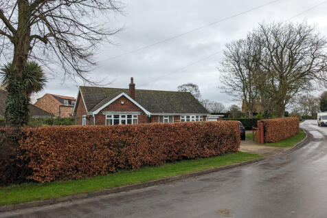 Road view of the property