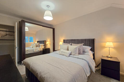 Bedroom 2 w/ Wardrobes