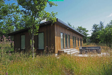 An existing holiday lodge nestling in the natural 