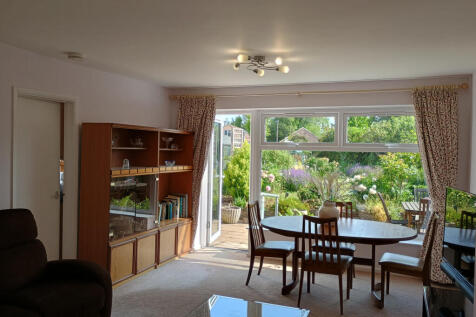 Lounge / dinning room leading to garden