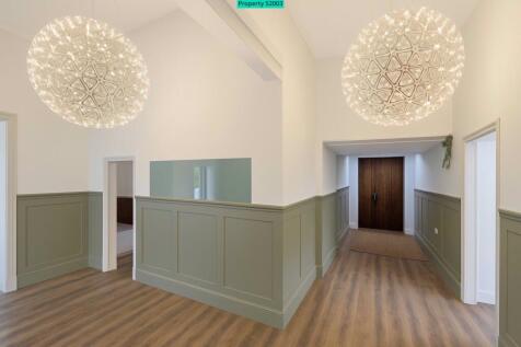 Hallway with Starburst Chandeliers