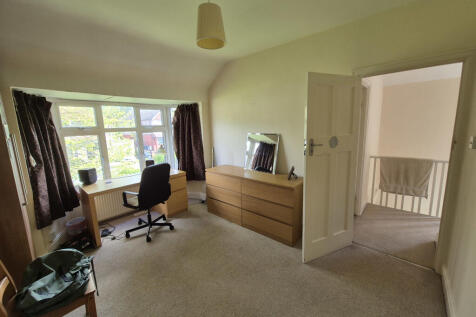 Second bedroom looking towards front garden