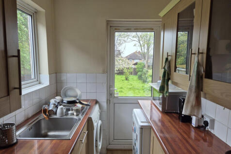 Kitchen looking towards back garden