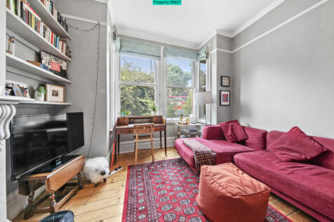HUGE SASH WINDOWS ALLOWING NATURAL LIGHT