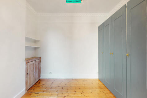 FLOOR TO CEILING BEDROOM WARDROBES