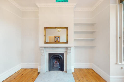 RECEPTION ROOM WITH FEATURE FIREPLACE