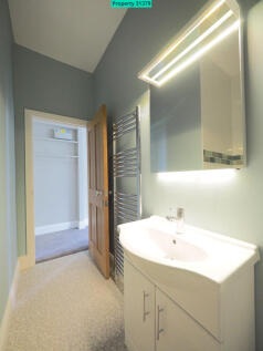 Cabinet over sink with illumination