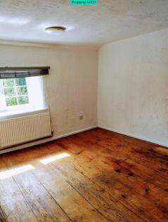 Bedroom with wooden floor