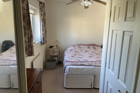 Entrance to main bed... cupboards, large wardrobe,