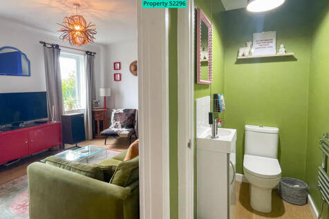Entrance towards living room and downstairs W.C