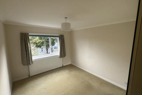 Bedroom with mirrored wardrobes