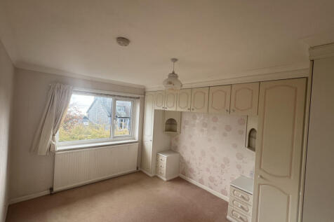 Bedroom with fitted wardrobe
