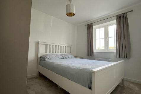 Bedroom 2 with fitted wardrobes