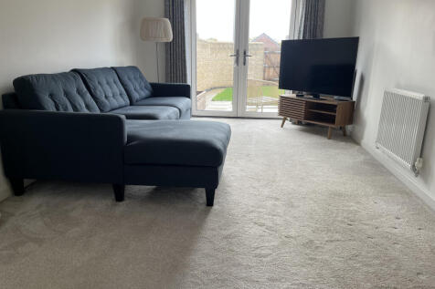 Dual aspect lounge with French doors