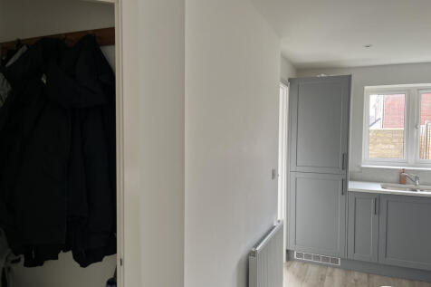 Separate downstairs cloakroom / storage cupboard