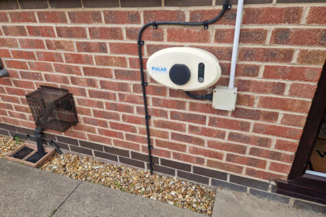 Electric car charger to front of house