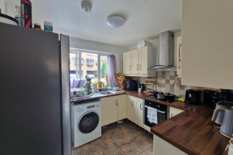 Kitchen looks out to front