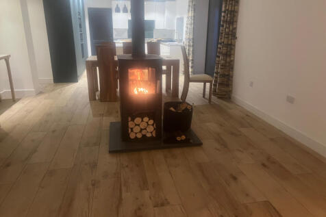 Double sided log burner