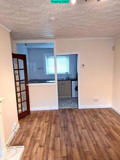 Living Room with Kitchen off