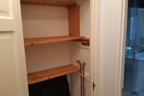 UTILITY CUPBOARD IN HALLWAY