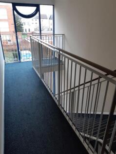 LANDING OUTSIDE ENTRANCE TO FLAT